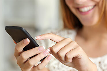 Woman making storage rental payment in Janesville, WI